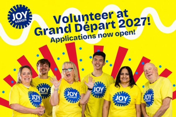JOY Makers volunteers promoting applications for the 2027 Tour de France Grand Départ in Edinburgh.