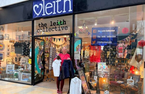 Sara Thomson outside The Leith Collective with school uniform items for the free Edinburgh uniform exchange