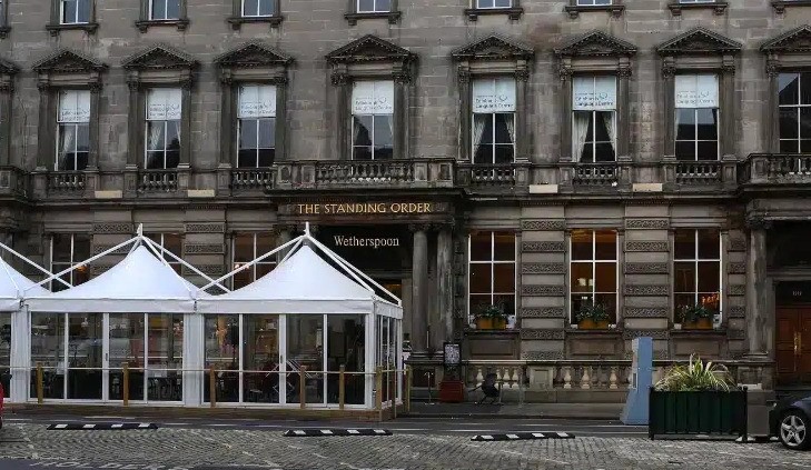 The Standing Order Wetherspoons on George Street Edinburgh with outdoor seating and marquees