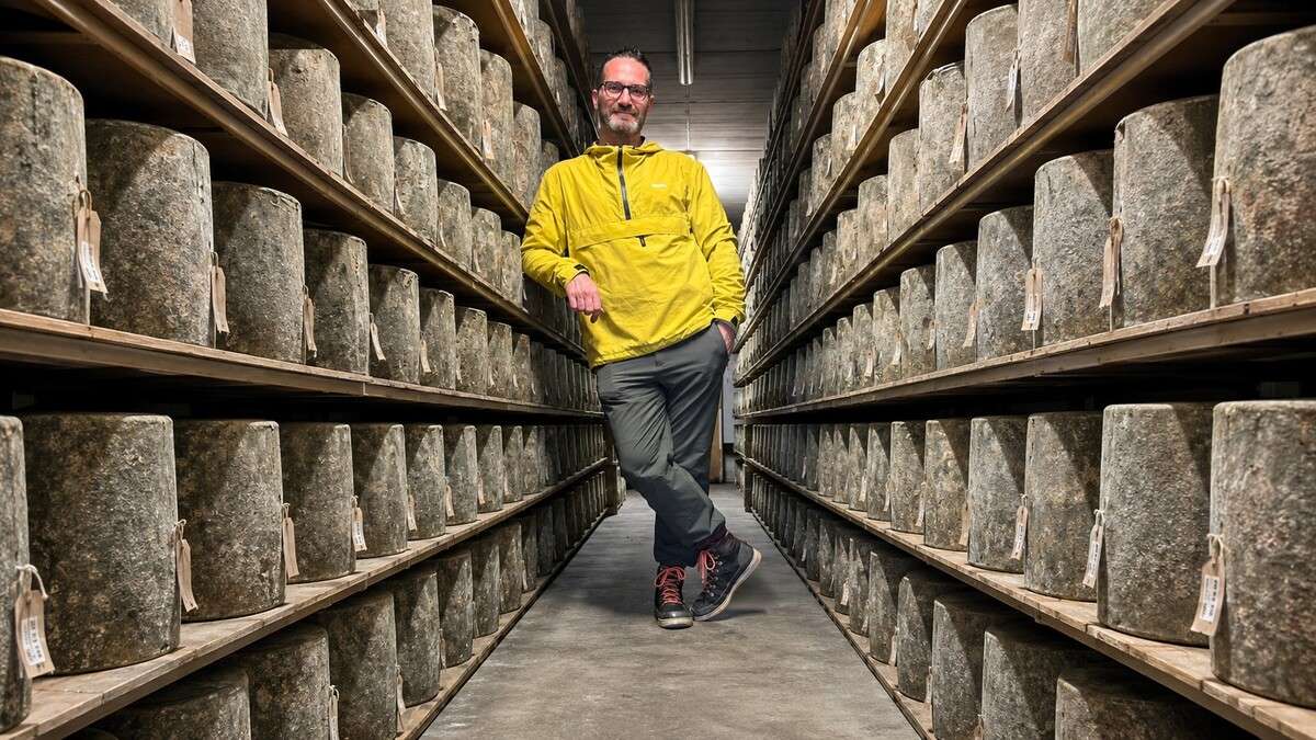 Neil Cunningham surrounded by artisan cheeses ahead of The Big Cheese opening in Edinburgh