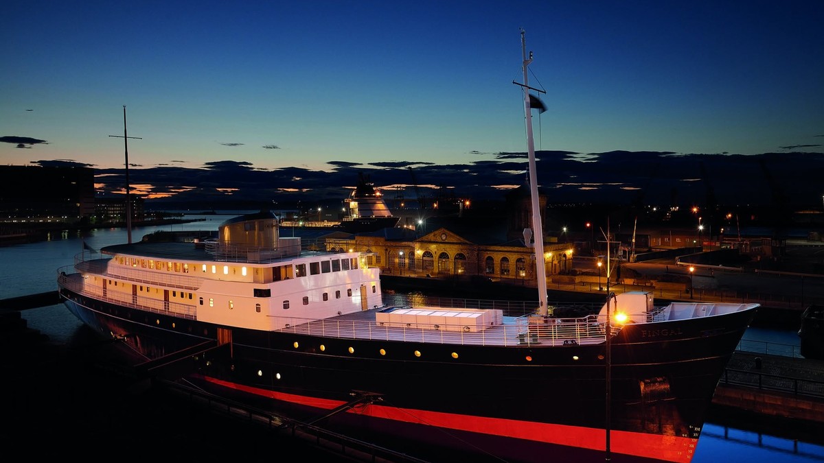 Fingal floating hotel moored at Alexandra Dock in Leith at dusk