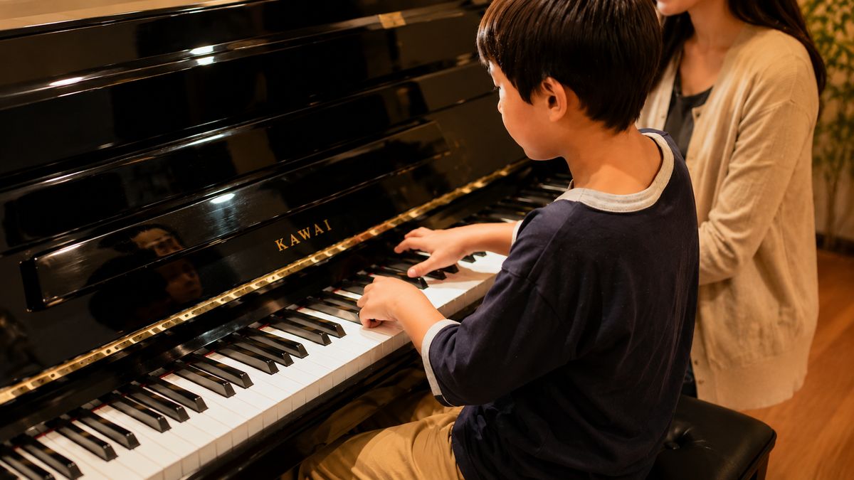 Child learning piano at Morningside School of Music in Edinburgh
